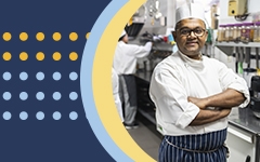 Image of hospitality workers in a commercial kitchen